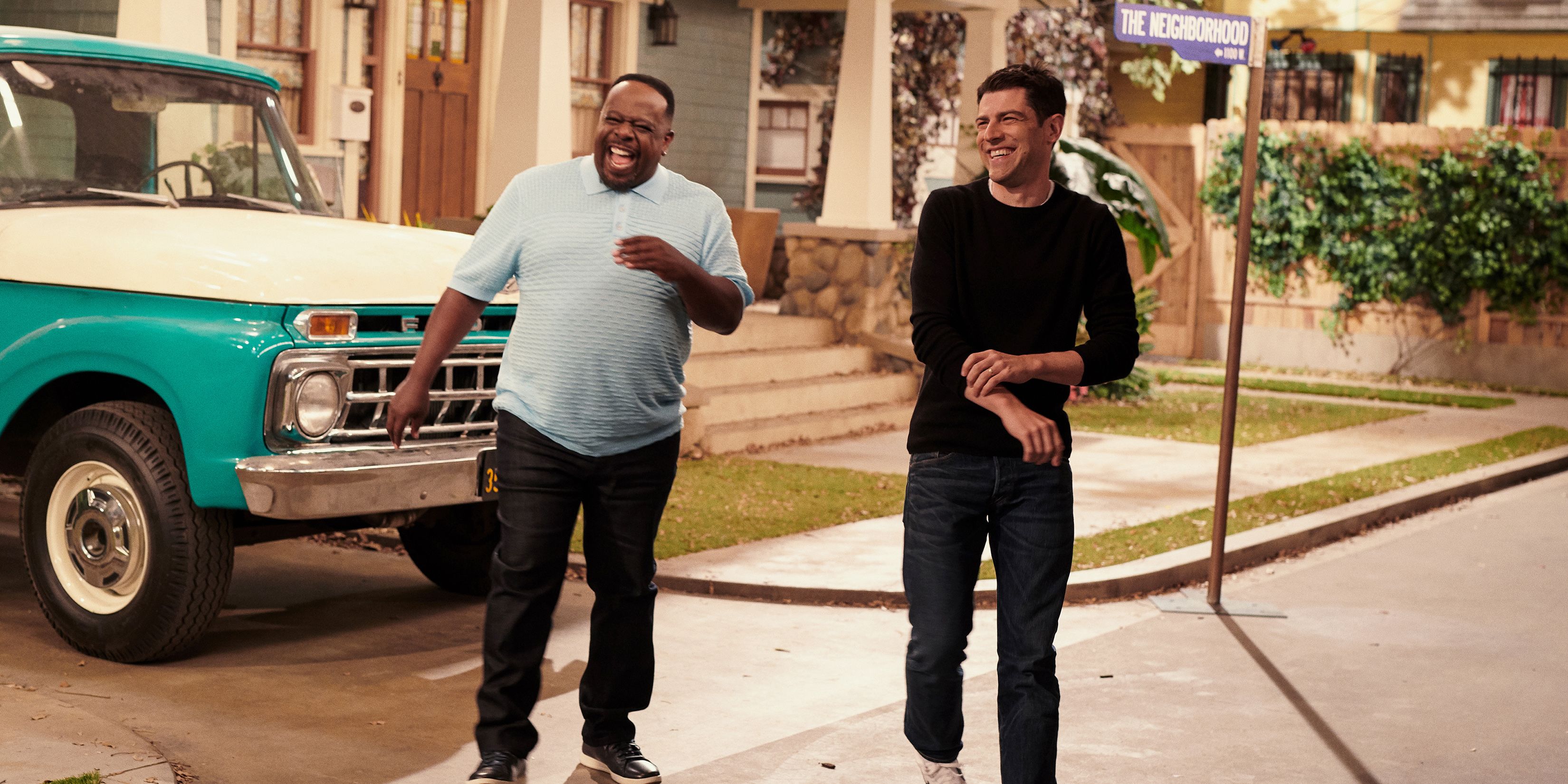 Cedric the Entertainer and Max Greenfield walking on the street