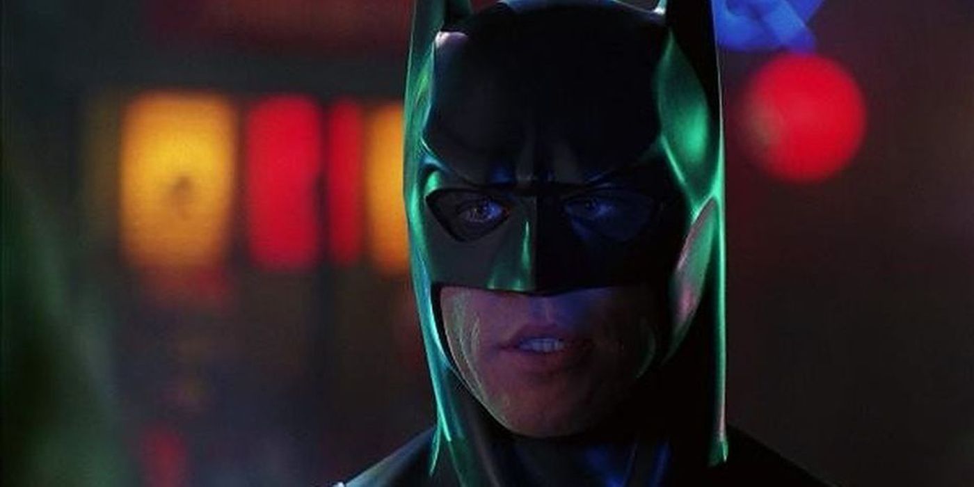 Val Kilmer talking to someone as Batman.