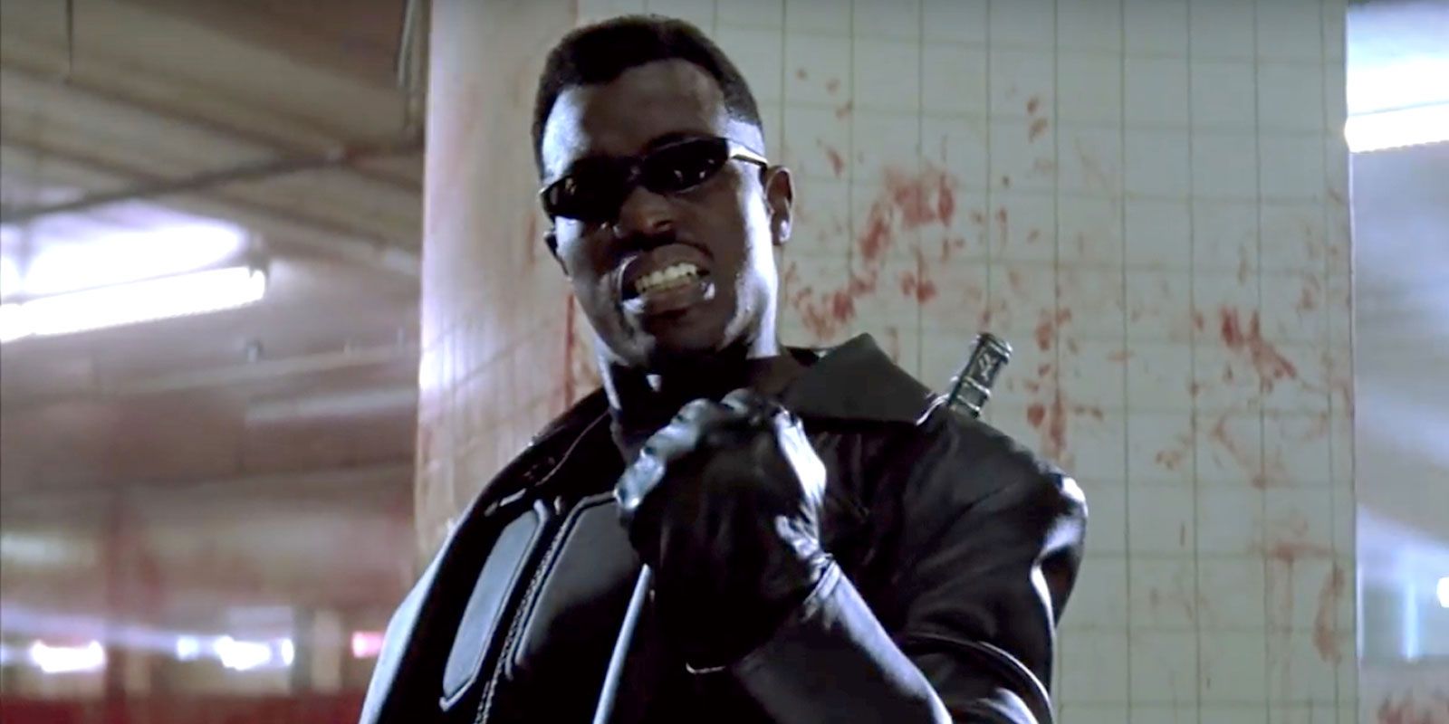 Wesley Snipes, victorious, as Blade.
