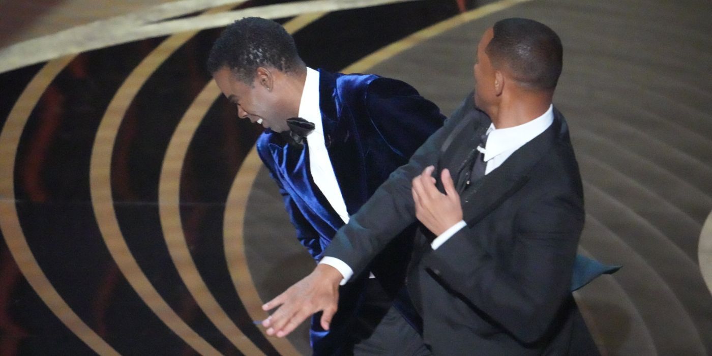 Will Smith slapping Chris Rock on stage during The Oscars