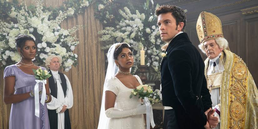 Edwina (Charithra Chandran) and Anthony (Jonathan Bailey) on the altar in Bridgerton.