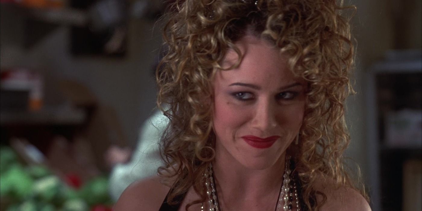 Christine Taylor smiling in The Wedding Singer.