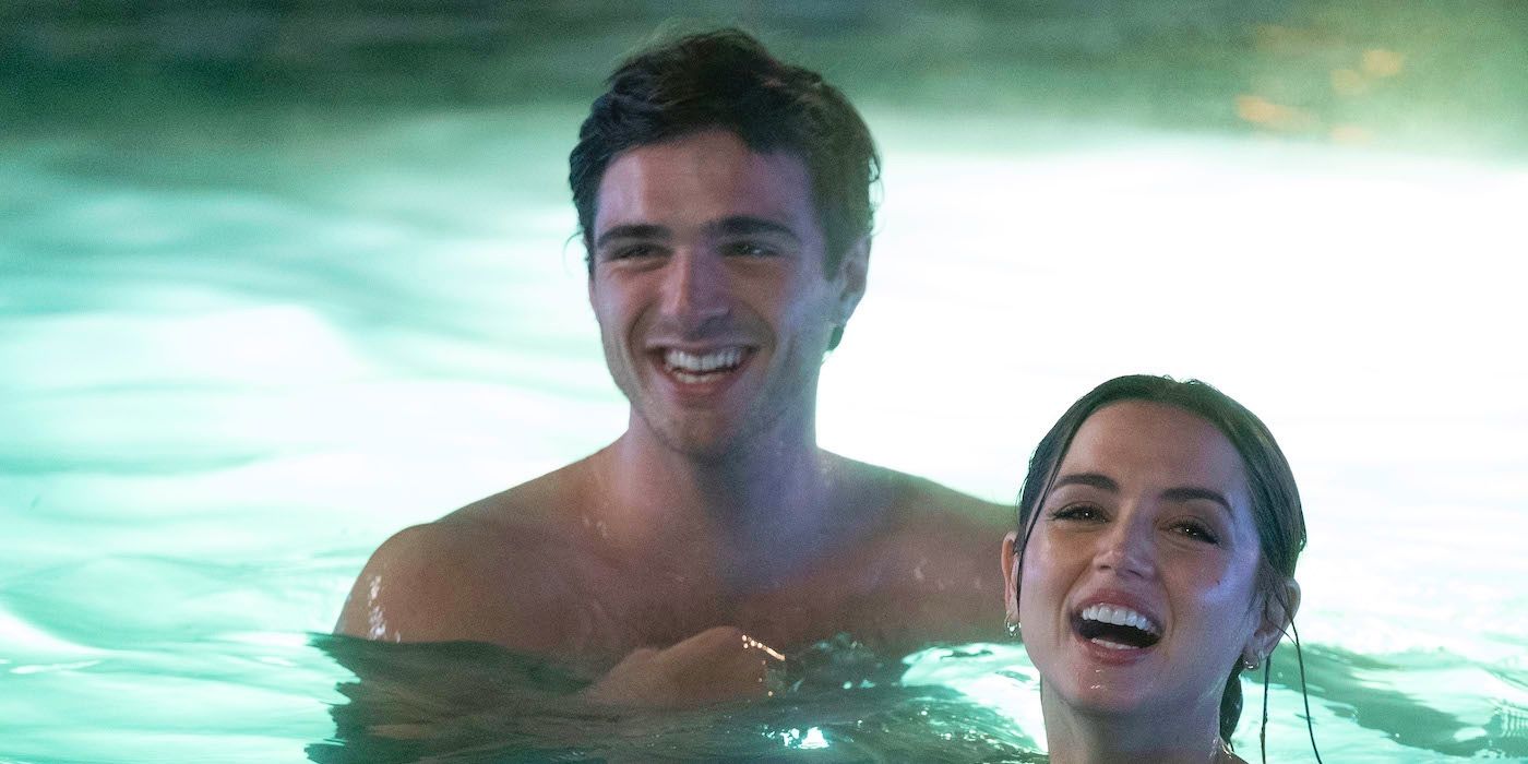 Jacob Elordi laughs in a pool with Ana de Armas in Deep Water.