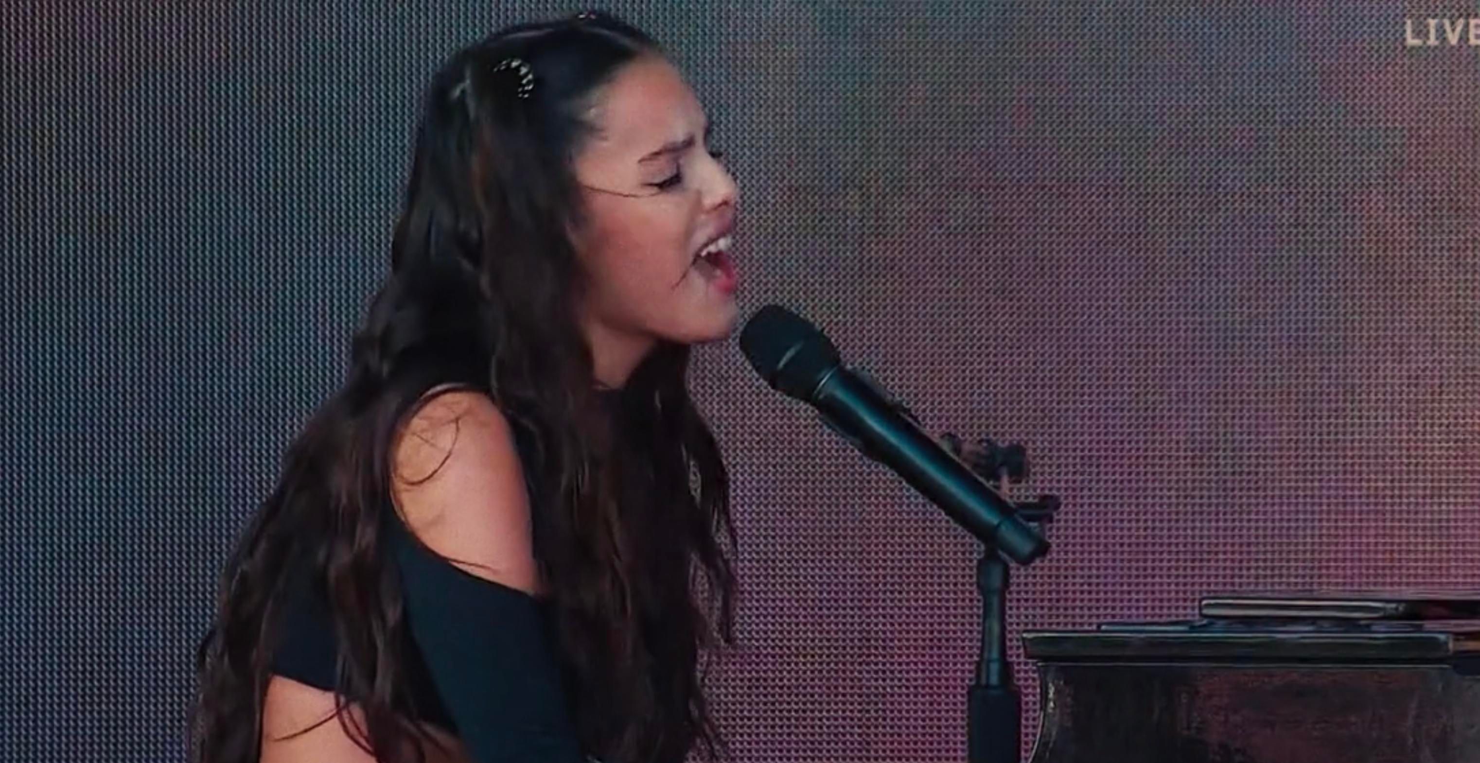 Olivia Rodrigo sings at a concert
