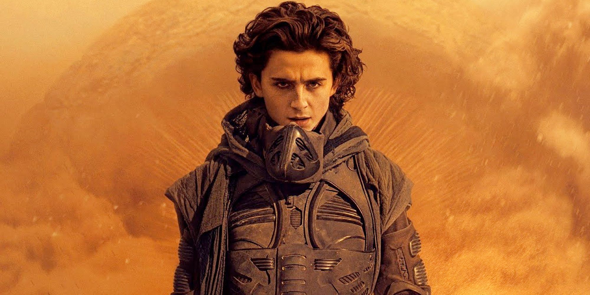 Paul Atreides and a sand worm in Dune.