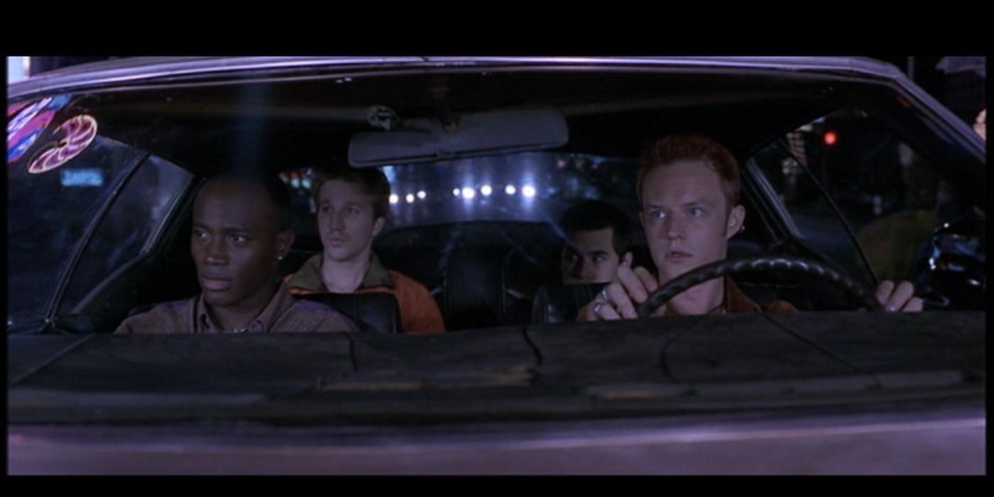 Breckin Meyers and Taye Diggs in a car in Go.