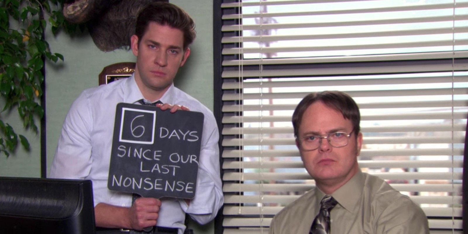 Jim and Dwight posing in The Office together