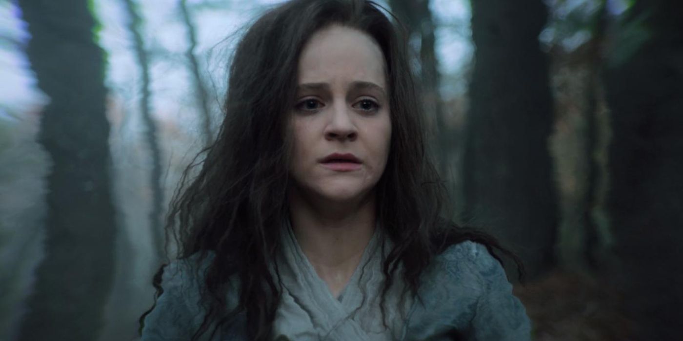 Mathilde DeHaye looking lost in the woods in a scene from Castle Rock.