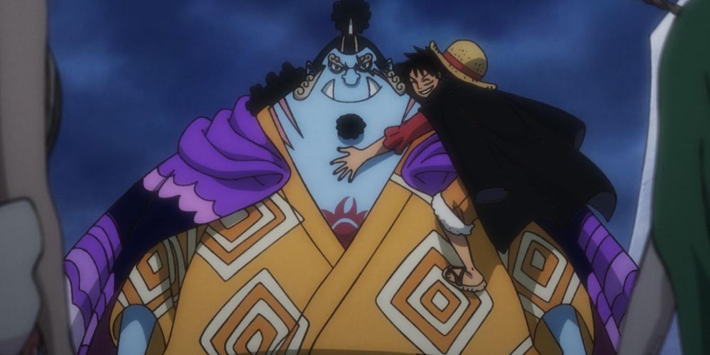 Luffy hugs Jinbe in One Piece