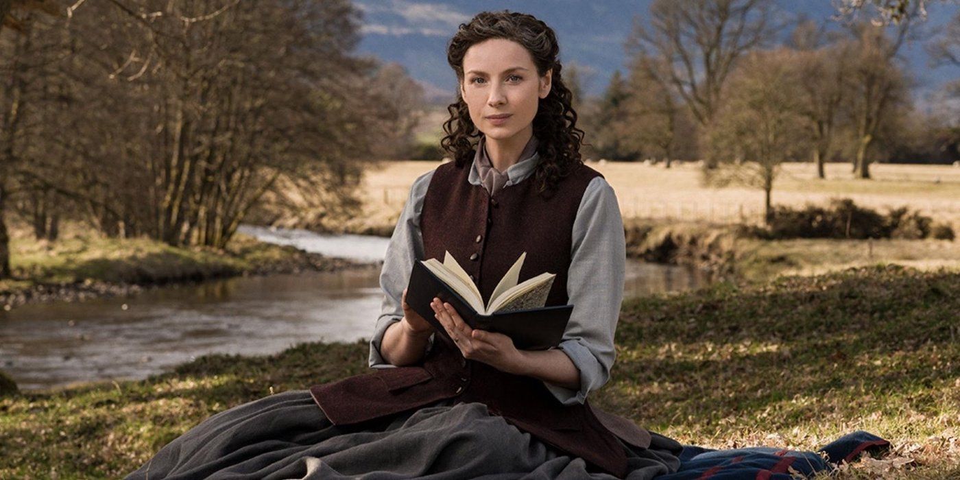 Claire reading a book on Outlander
