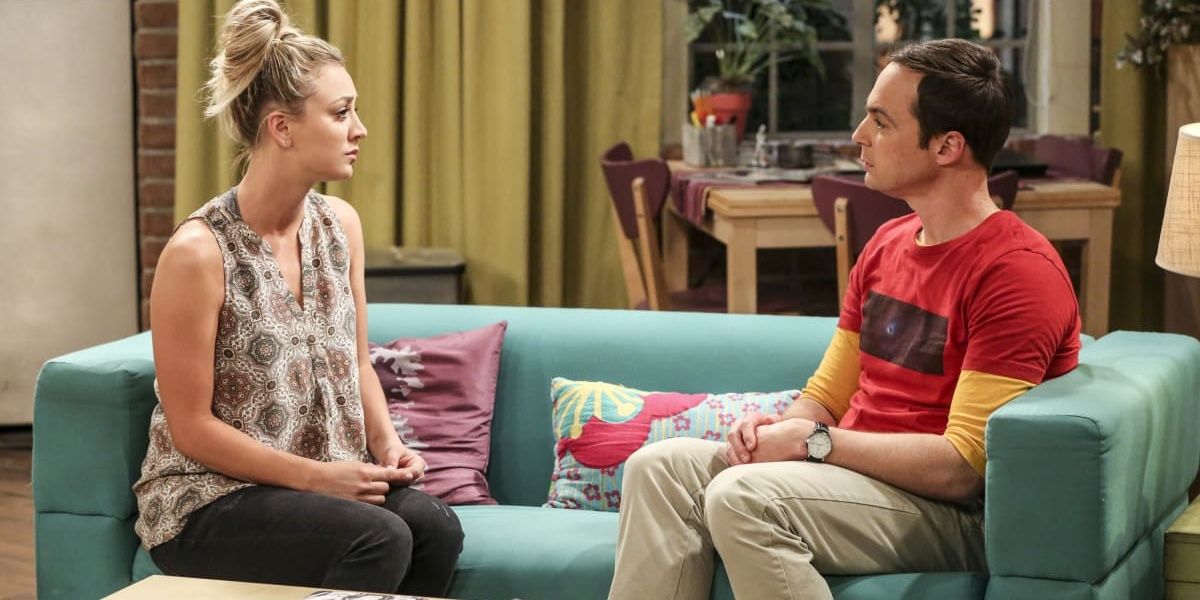 Penny and Sheldon sitting on her couch in TBBT