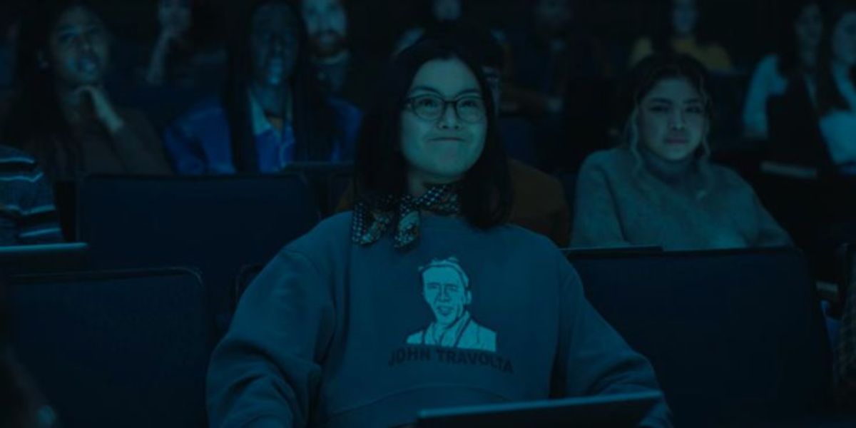 A girl wearing a Face/Off shirt in The Adam Project