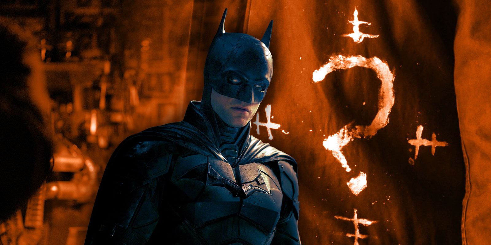 Pattinson's Batman with one of Riddler's hand drawn question marks.