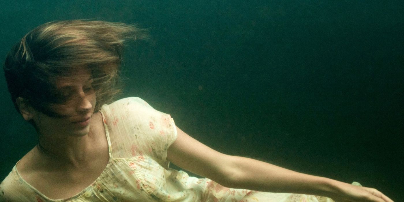 A woman floats underwater in the movie Elena