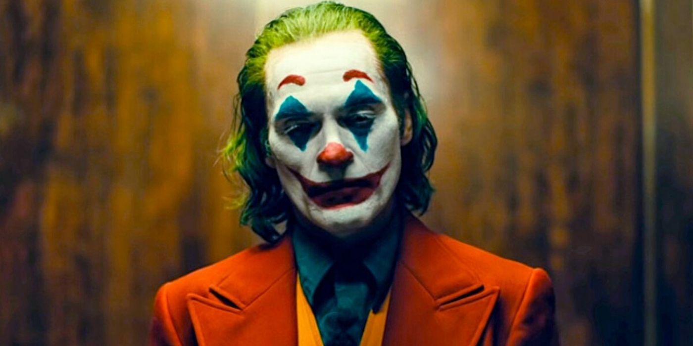 Joaquin Phoenix in green hair and makeup as Joker