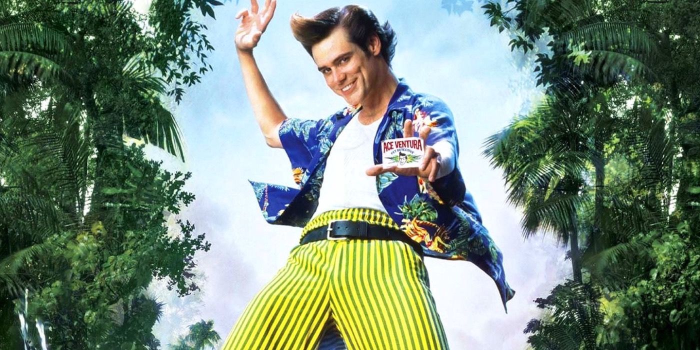 Jim Carrey as Ace Ventura, showing his ID badge to the camera