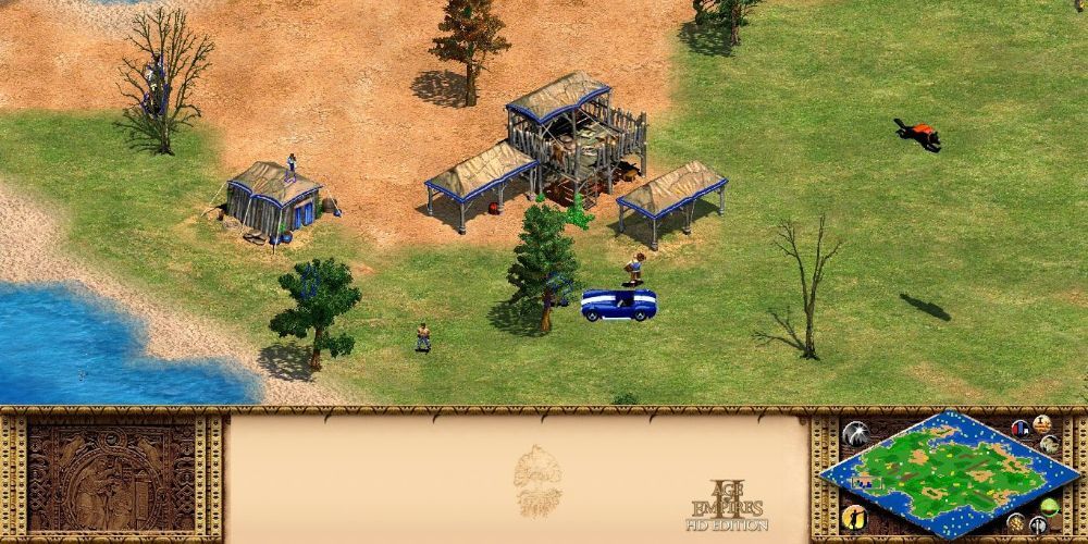 Gameplay from Age of Empires II- The Age of Kings, as a town is slowly built up,