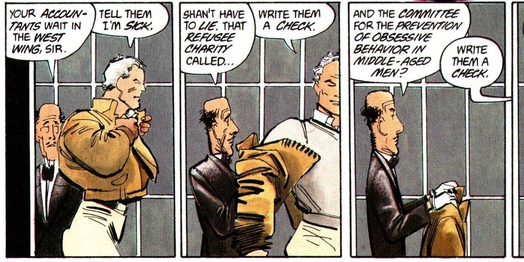 Alfred helps Bruce Wayne wear his coat in Dark Knight Returns