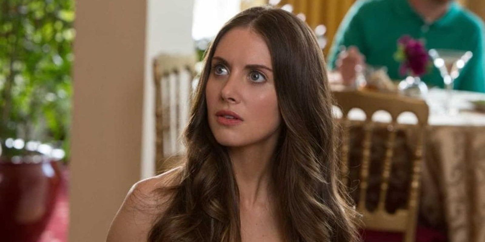 Alison Brie looking up in Spin Me Round