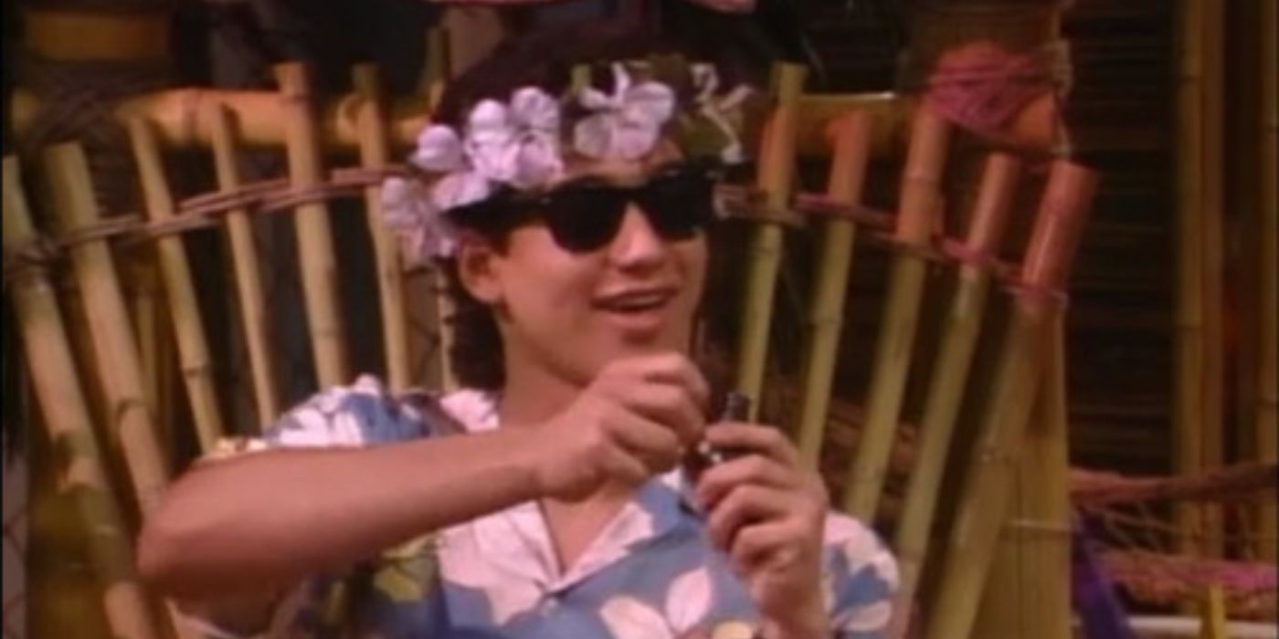 Slater dressed in Hawaiian accessories
