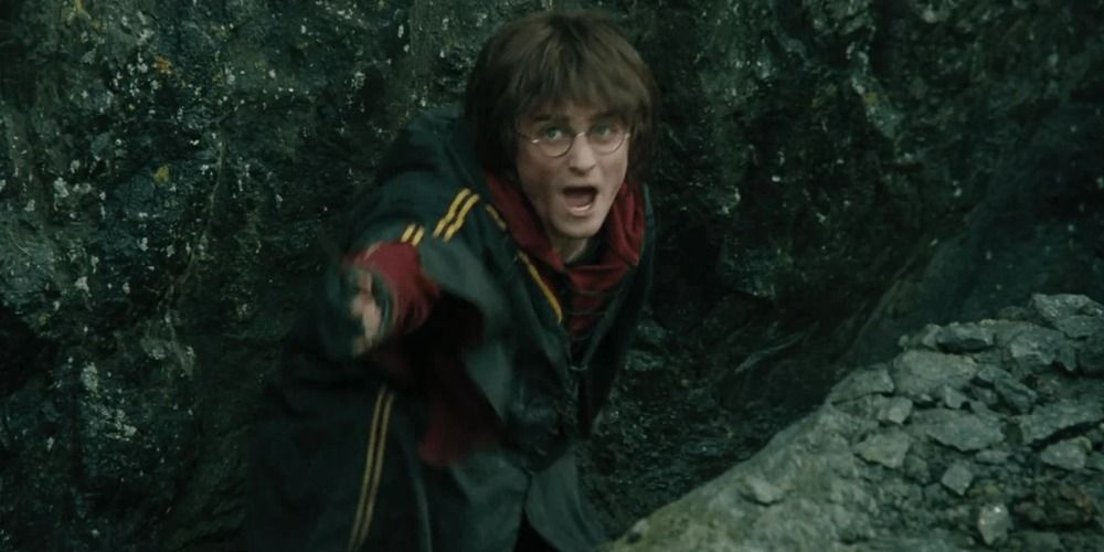 An image of Harry Potter using the accio spell in Goblet of Fire