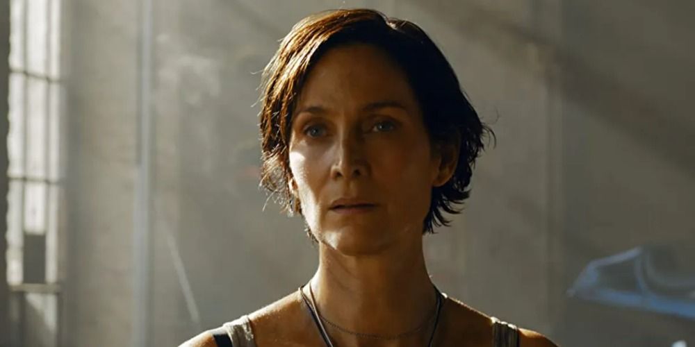 An image of Trinity looking serious in The Matrix