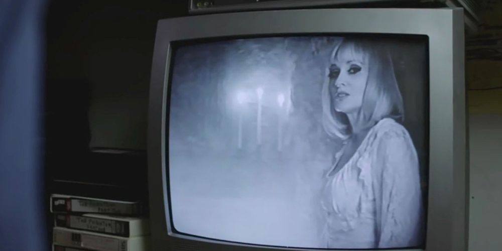 Evelyn appears on TV in Beyond The Gates