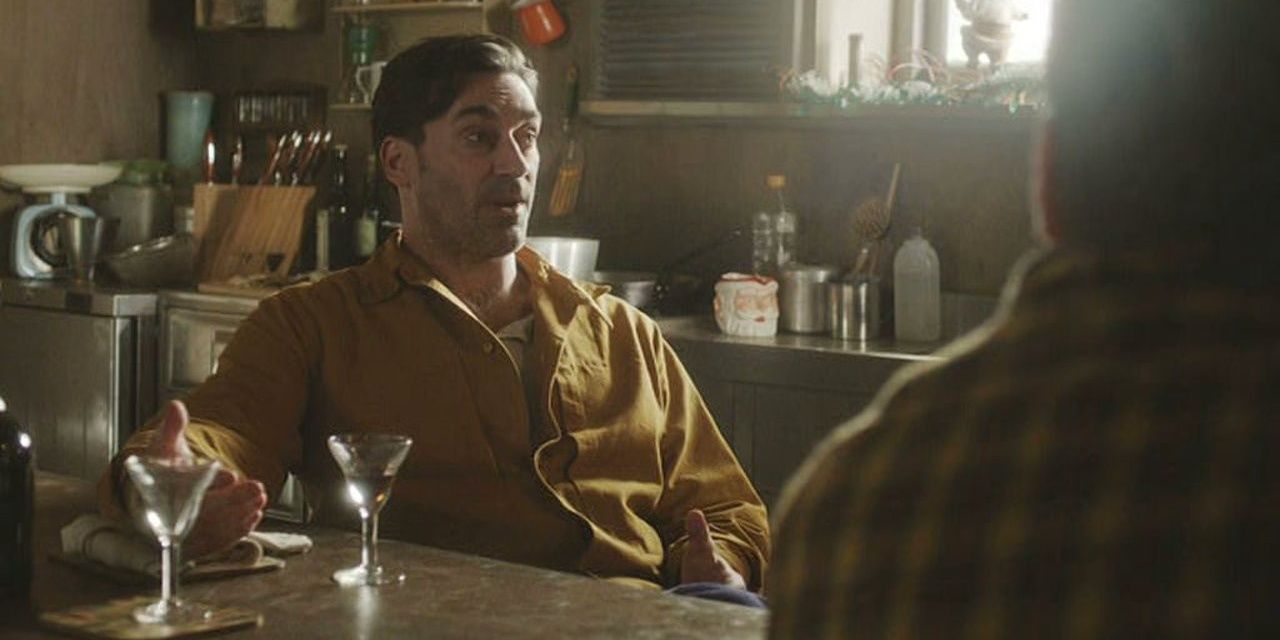 Jon Hamm sat at a table in Black Mirror's &quot;White Christmas&quot;