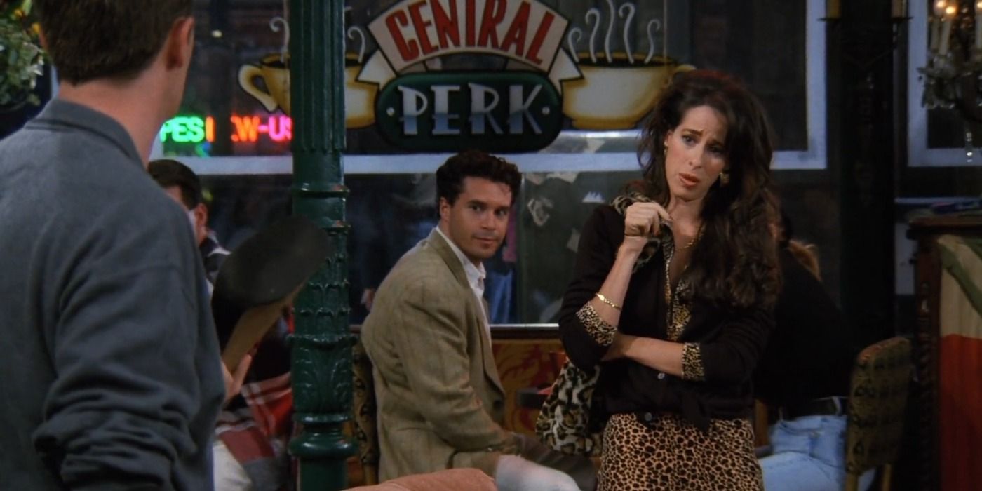 Chandler holds Janice's shoe as she waves goodbye while leaving Central Perk