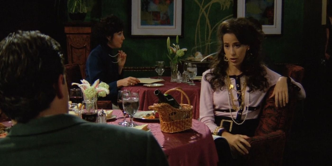 Chandler and Janice seated in a restaurant in Friends