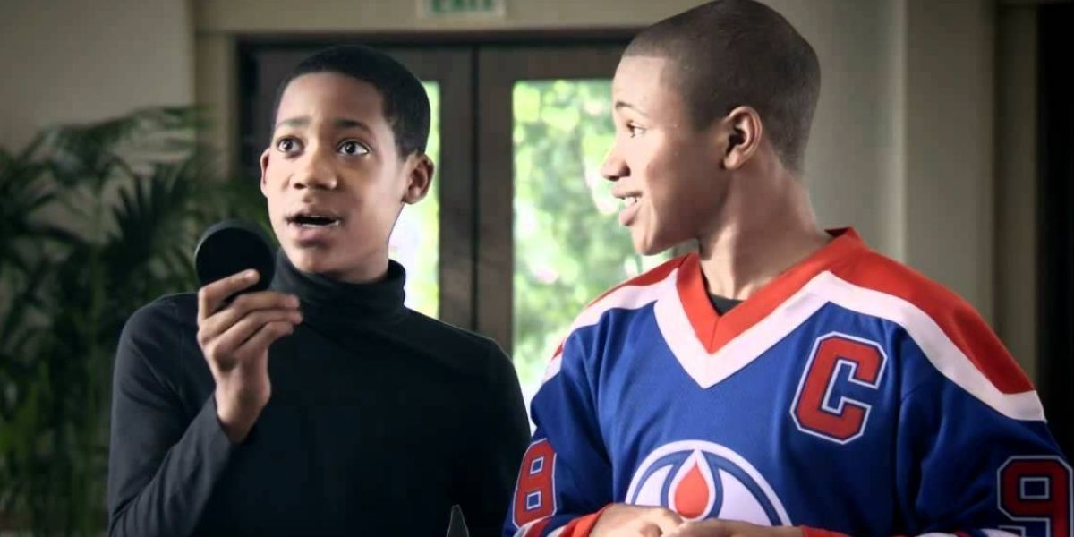 Chris and Drew with a hockey puck