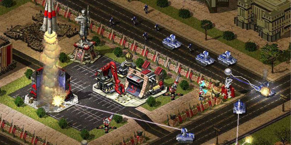 Gameplay from Command &amp; Conquer: Red Alert 2, as tanks attack a Kremlin building.