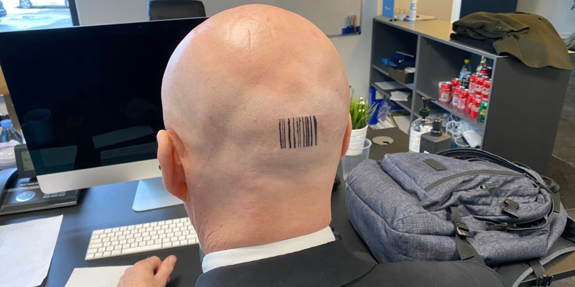 david bateson with barcode tattoo