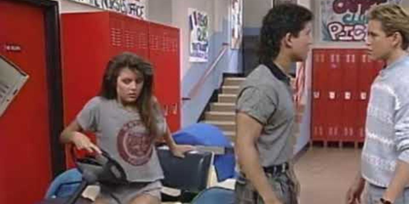 Zack and Slater fighting while Kelly watches