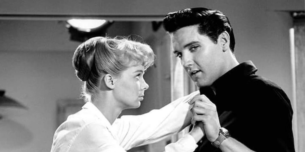Elvis looks at the camera while dancing in Girls! Girls! Girls!