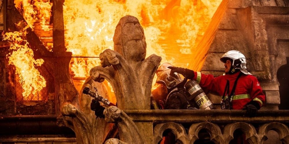 Firefighters trying to put out fire on Notre Dame in Notre-Dame On Fire