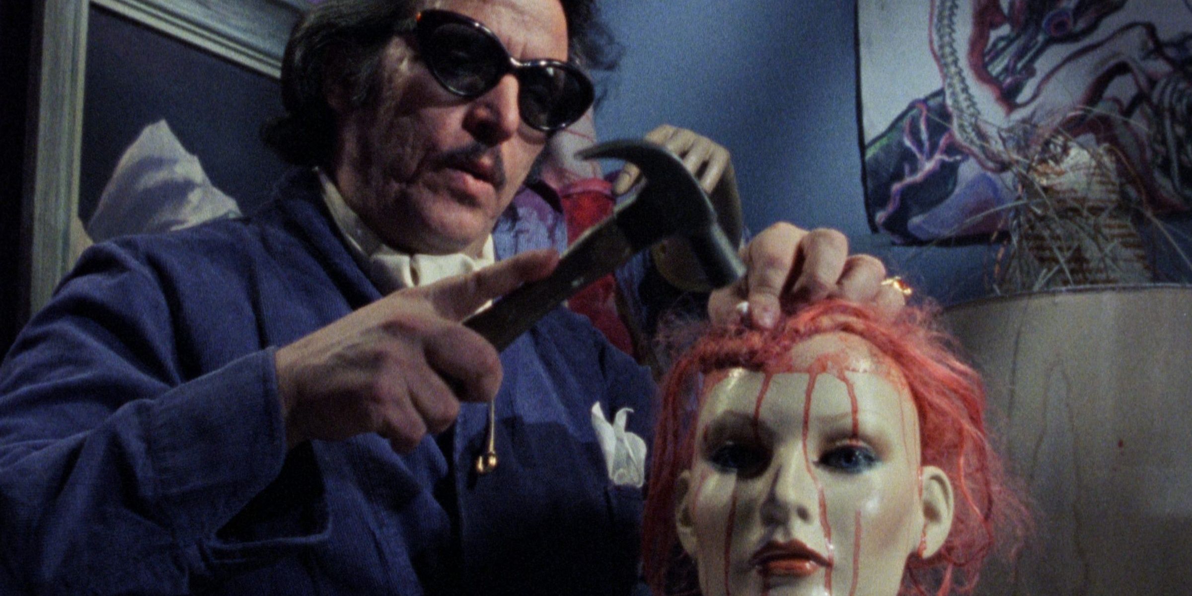 Frank hammering a nail into a mannequin's head in Maniac 