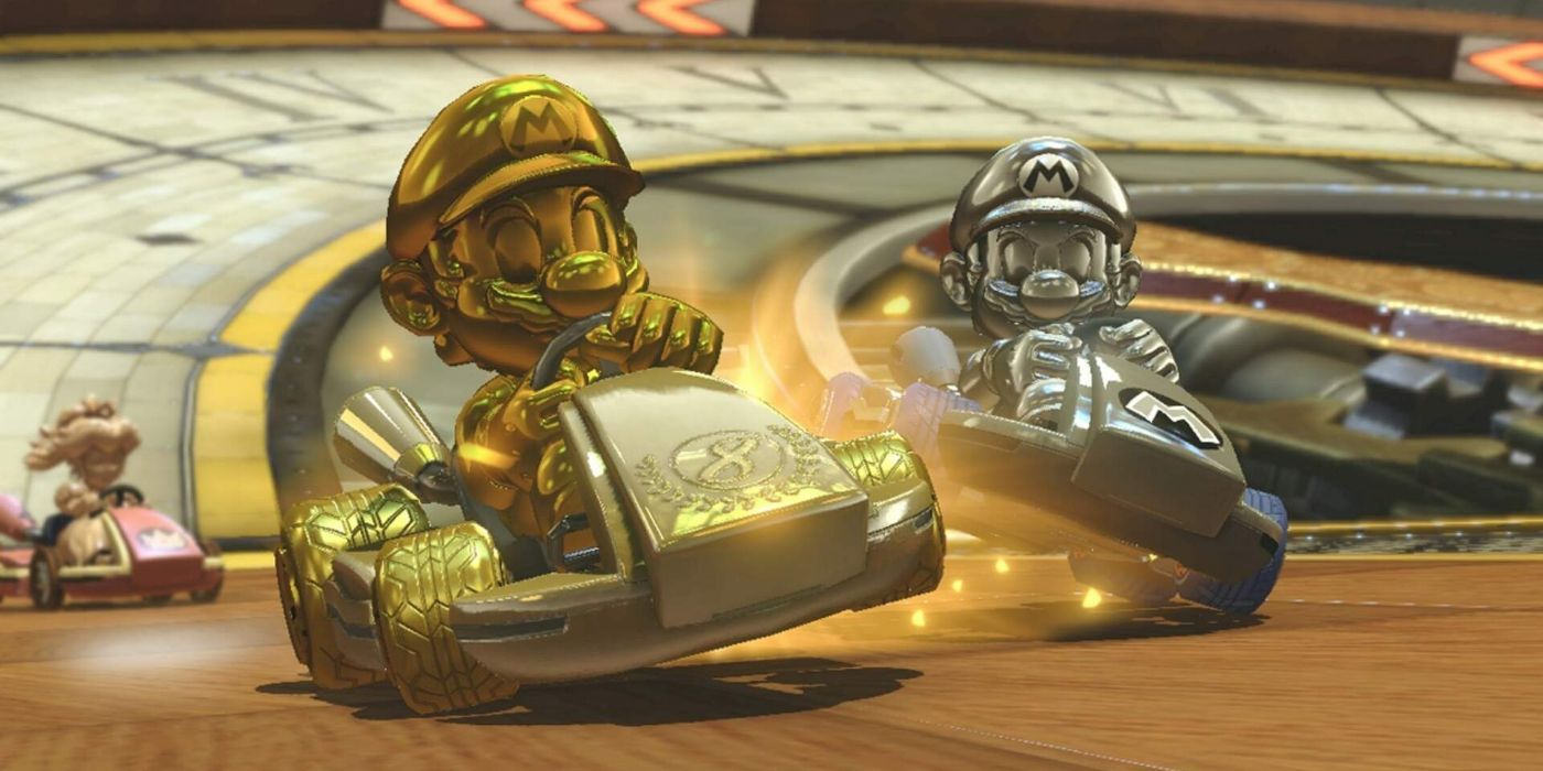 Gold Mario racing with Metal Mario in Mario Kart 8