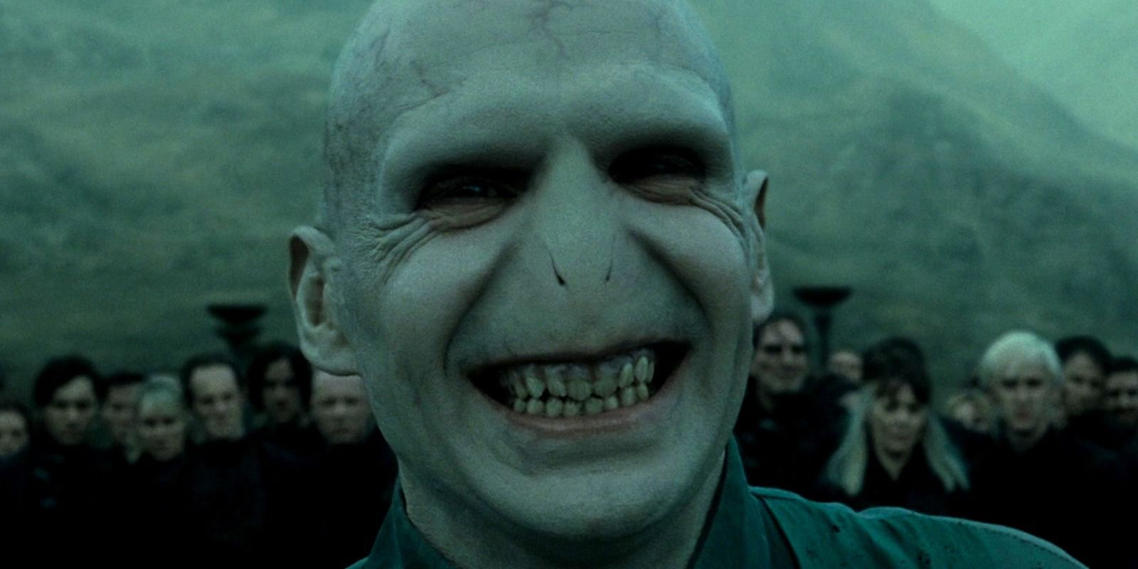 An image of Voldemort smiling in the film adaptation of Harry Potter