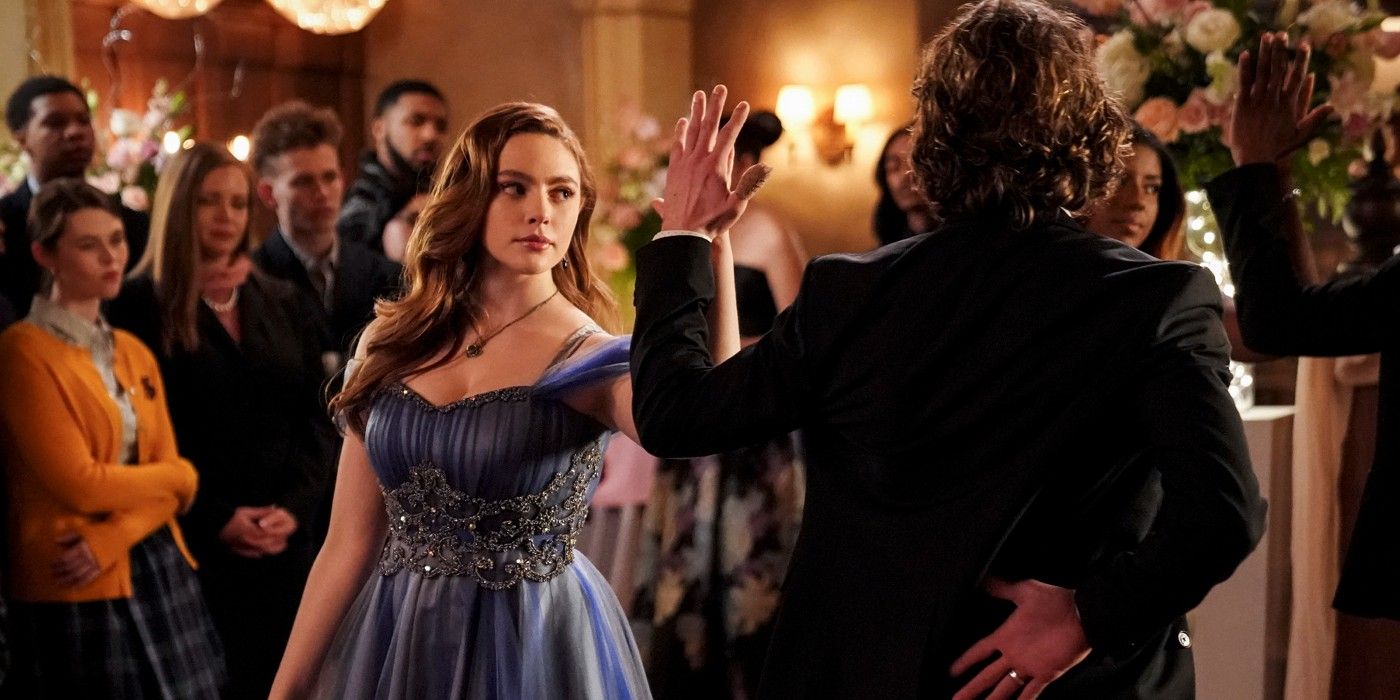 Hope dancing with Roman at the Miss Mystic Falls Pageant in Legacies