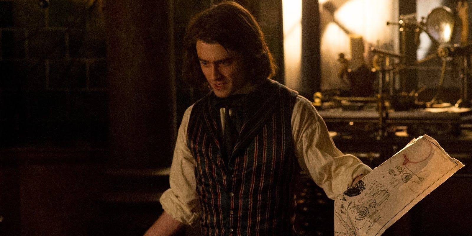 Igor with a blueprint in his hand in Victor Frankenstein Cropped