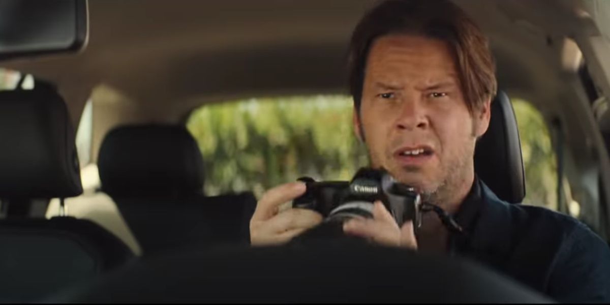Martin (Ike Barinholtz) with a surveillance camera in The Unbearable Weight of Massive Talent