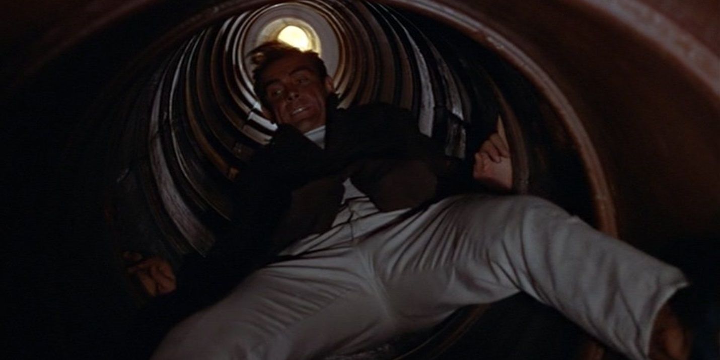 James Bond climbs through a vent in Dr No