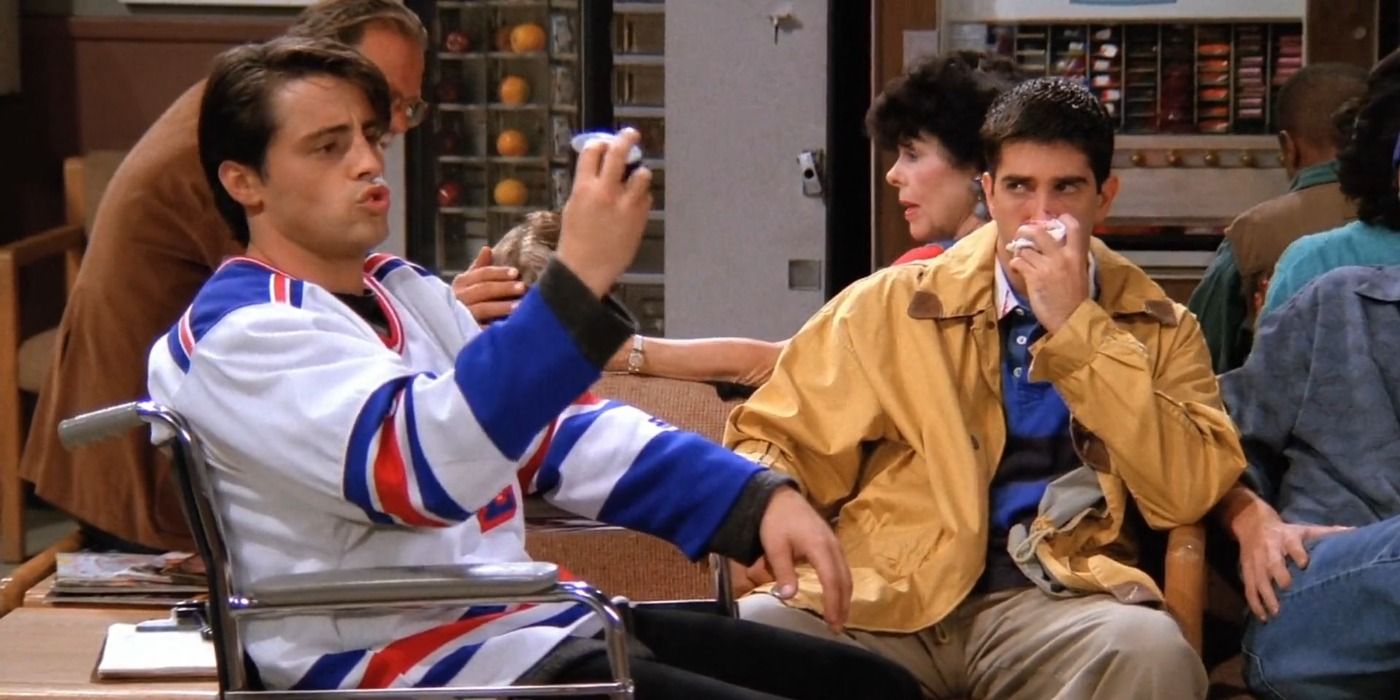 Joey plays with an ice hockey puck while waiting around and Ross covers his nose in Friends