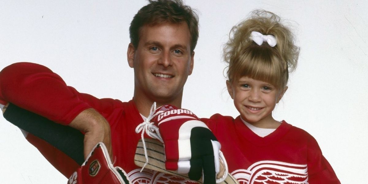Joey and Michelle in hockey jerseys