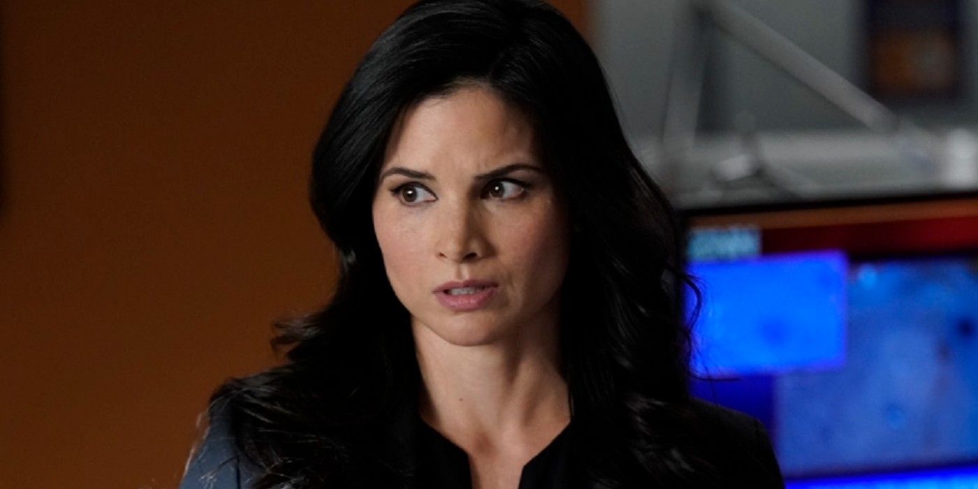 Katrina Law as Jessica Knight on NCIS with serious expression standing in front of a screen