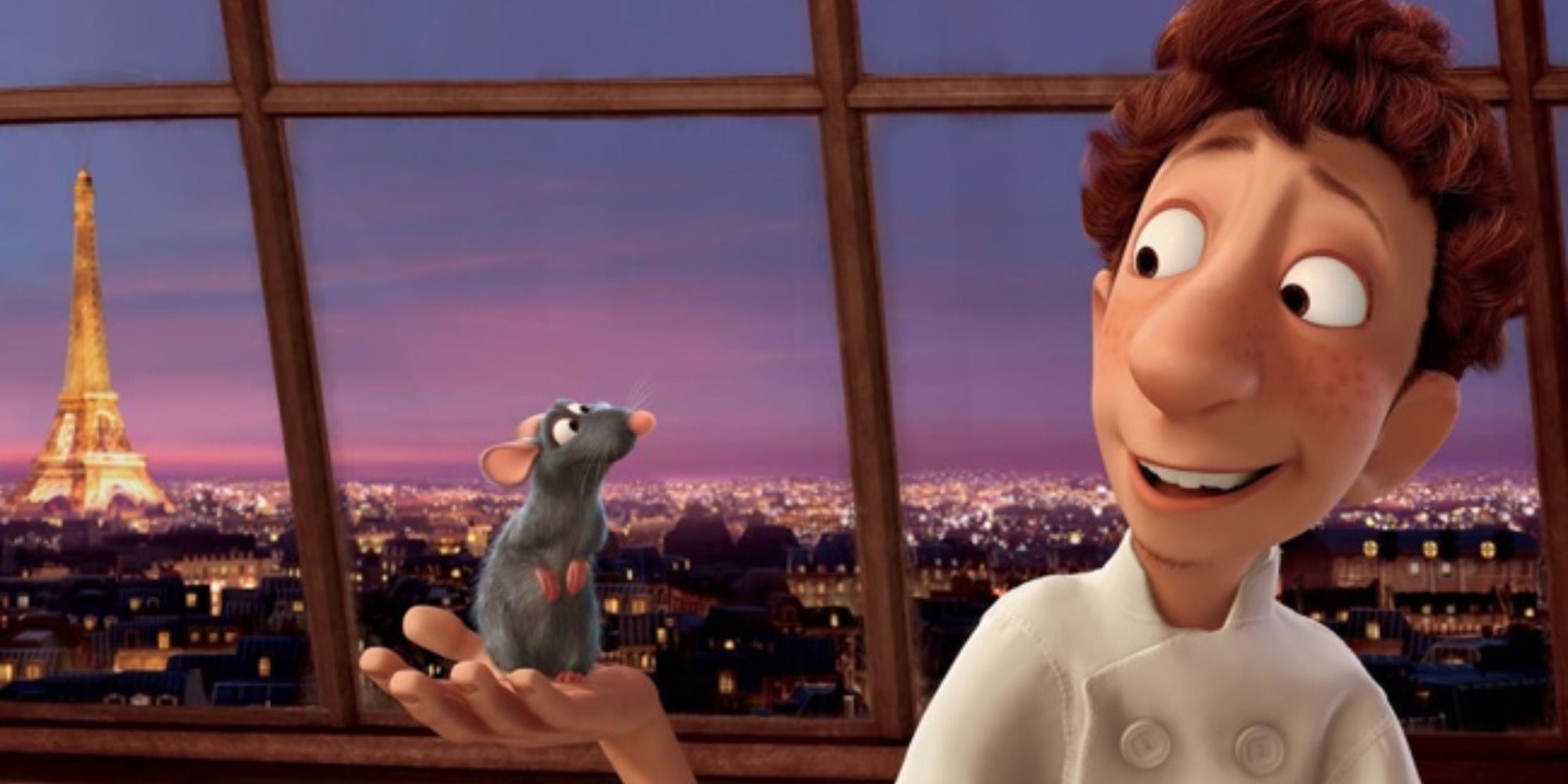 Imagen de Linguini y Remy sonriéndose en el nuevo loft en Ratatouille 