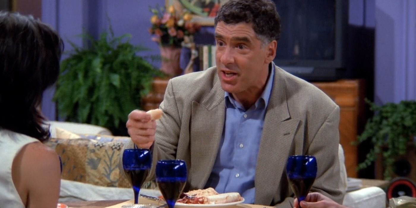 Elliot Gould como Jack Geller cenando en casa de Monica en Friends