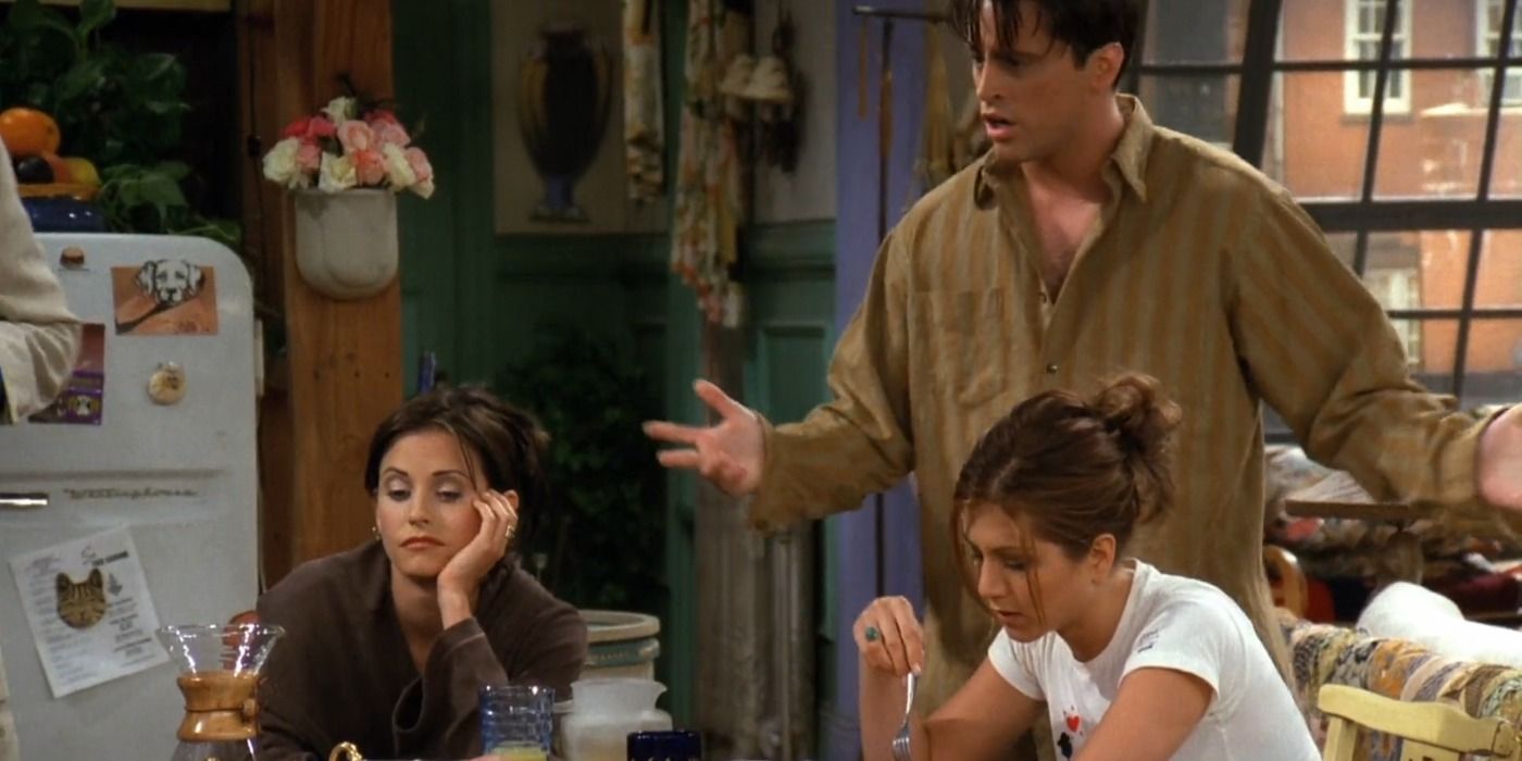 Monica, Joey and Rachel talking in the dining area in Friends