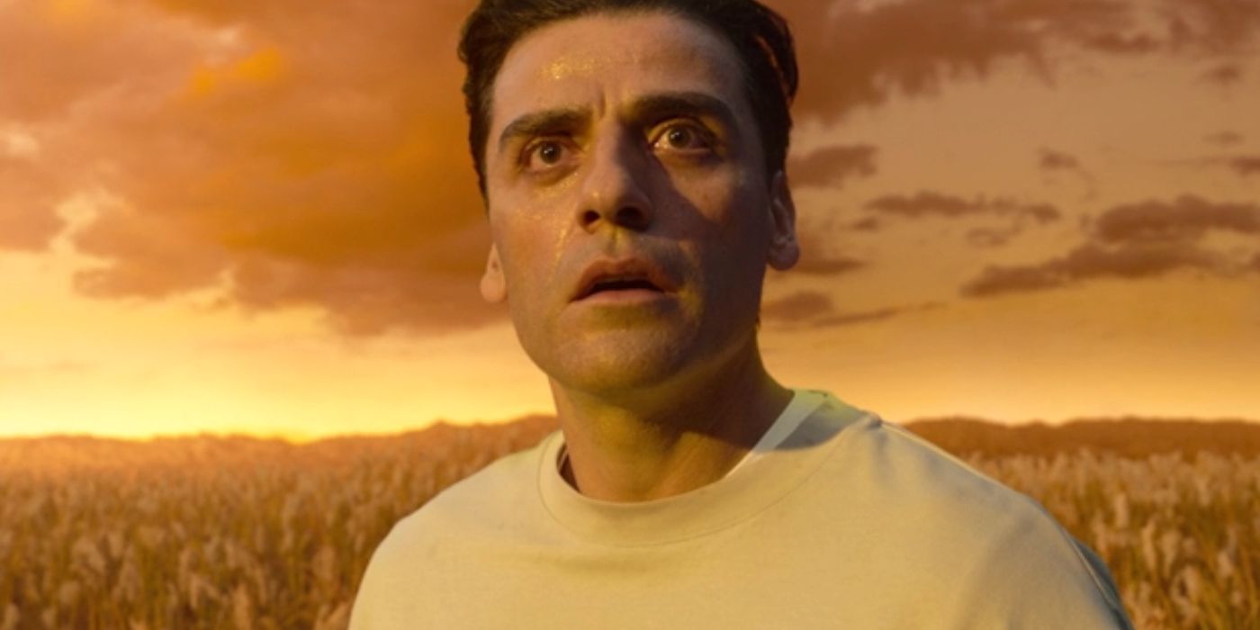 Marc Spector (Oscar Isaac) looks around at amazement in the field of reeds